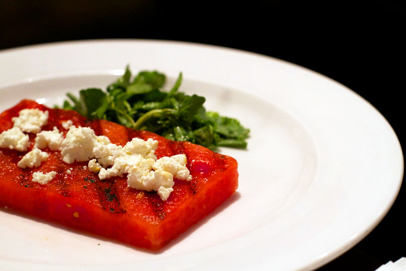 Grilled watermelon with goat cheese and watercress salad
